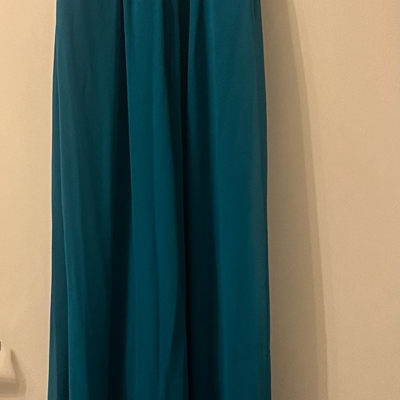 Cleaning out closet. Pics show how dress looks on - the color is oasis. - Picture 4 of 5